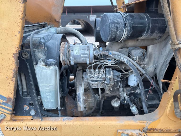 image for item EJ3166 1999 Case 580L backhoe