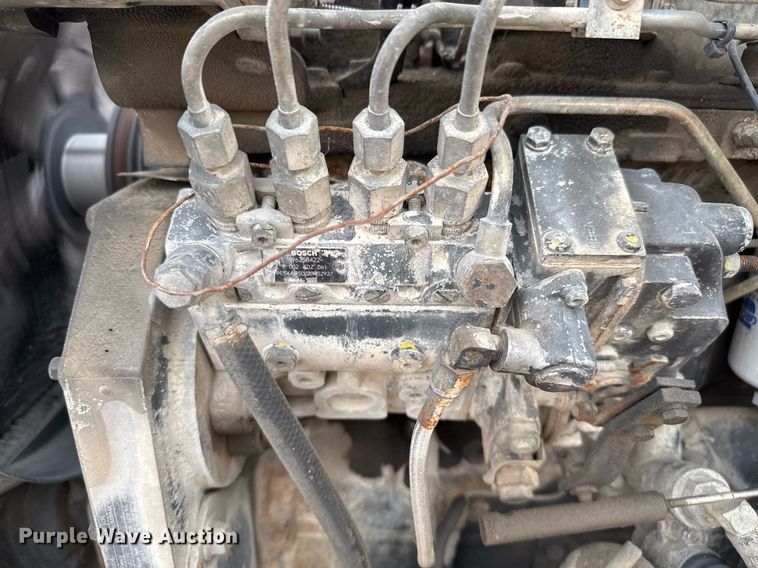 image for item EJ3166 1999 Case 580L backhoe