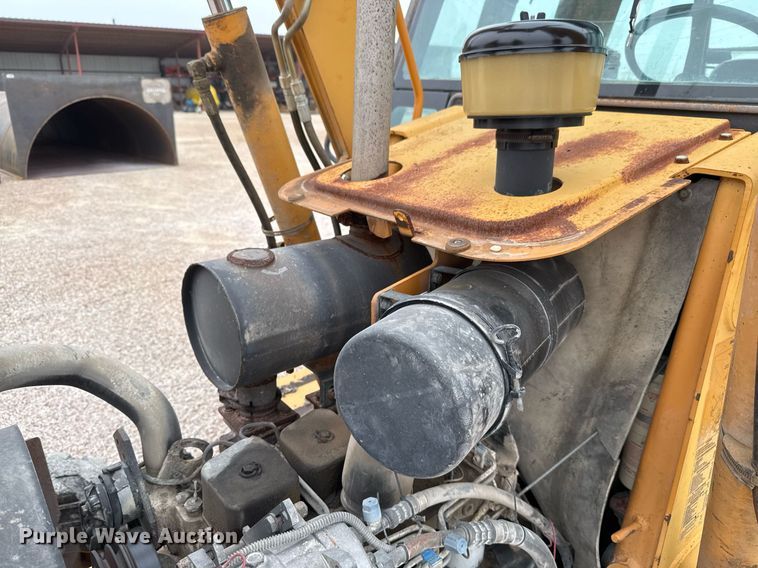 image for item EJ3166 1999 Case 580L backhoe