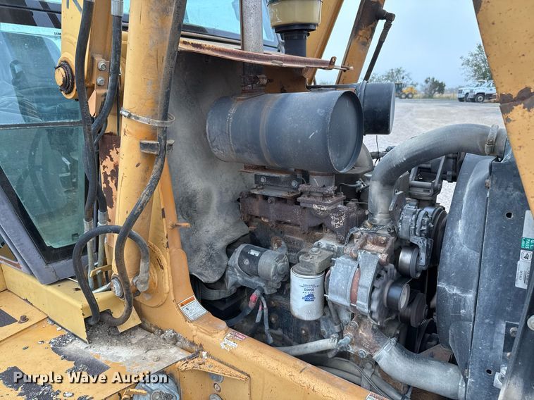 image for item EJ3166 1999 Case 580L backhoe