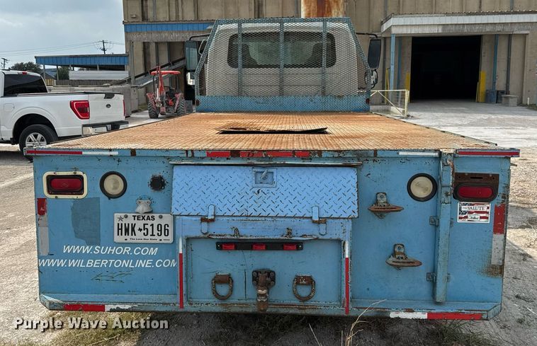image for item EJ3175 2002 International MA025 flatbed truck