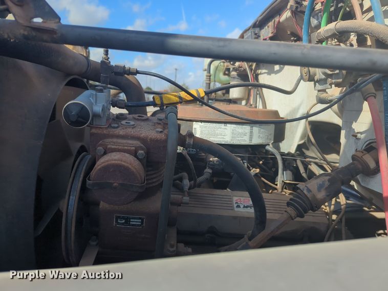 image for item EQ2414 1991 GMC Topkick rollback truck