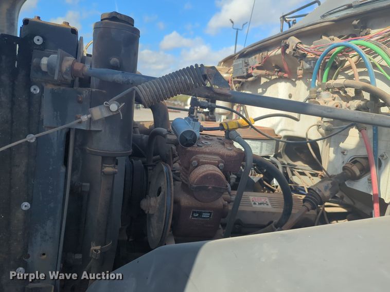 image for item EQ2414 1991 GMC Topkick rollback truck