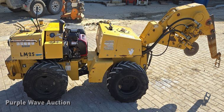 image for item EE8731 1999 Vermeer  LM25 vibratory cable plow