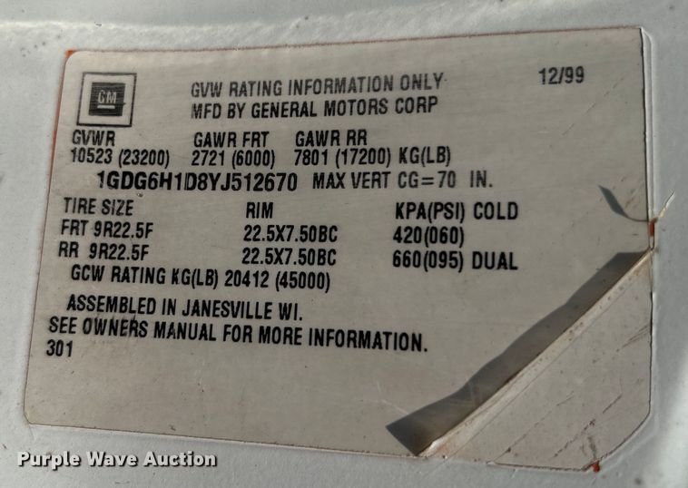 image for item EG0882 2000 GMC C6500 chipper truck