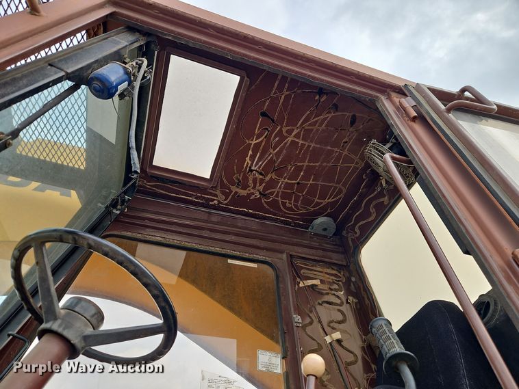 image for item EI8509 1999 Badger 1085C wheeled excavator