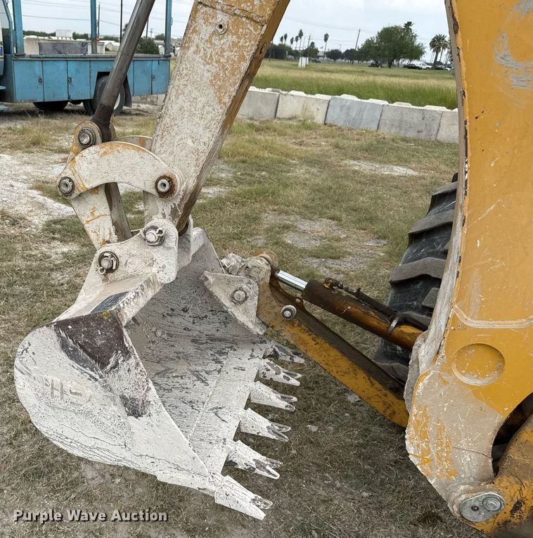 image for item EJ3174 2003 John Deere 110 backhoe