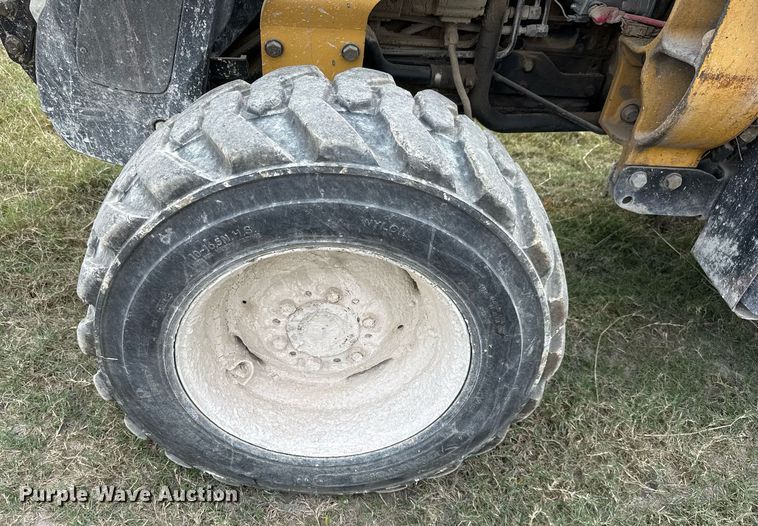 image for item EJ3174 2003 John Deere 110 backhoe