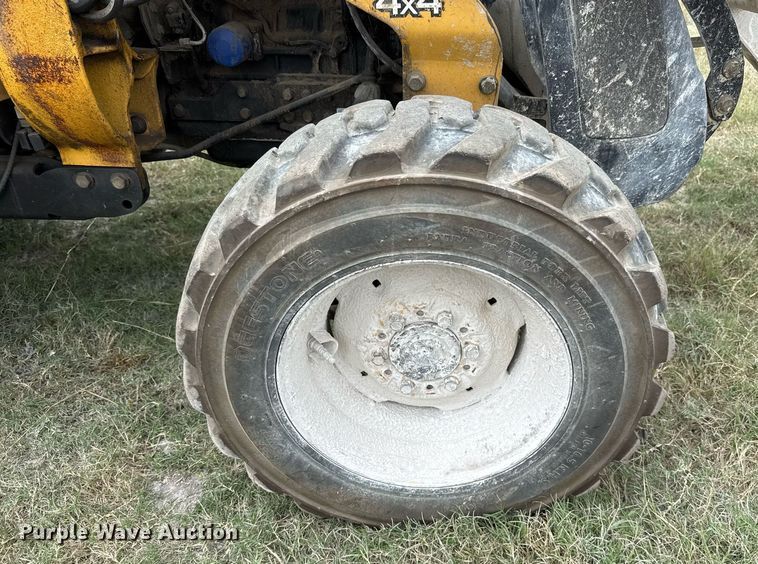 image for item EJ3174 2003 John Deere 110 backhoe