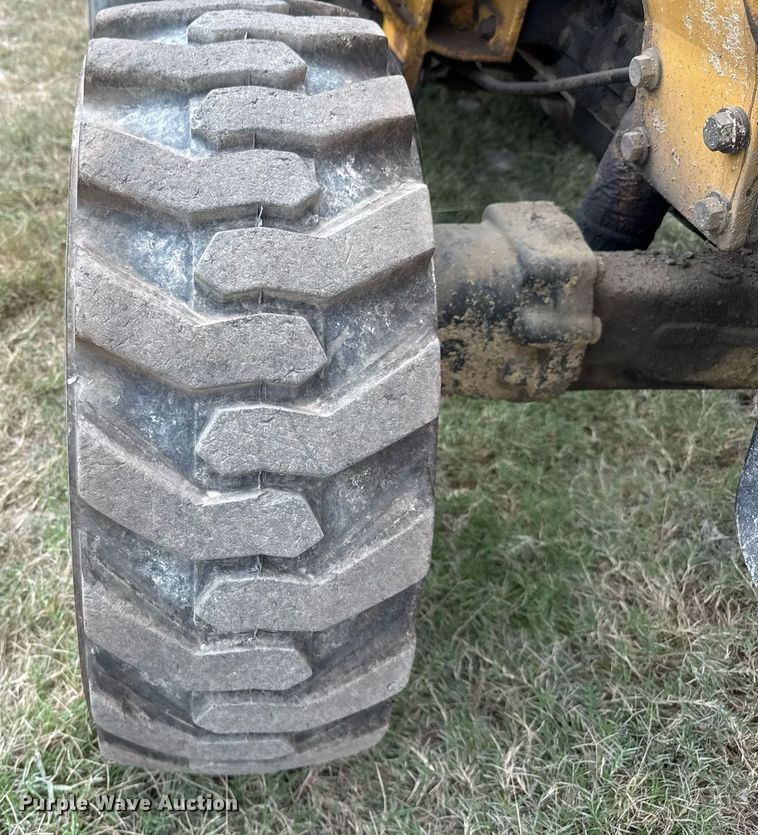 image for item EJ3174 2003 John Deere 110 backhoe