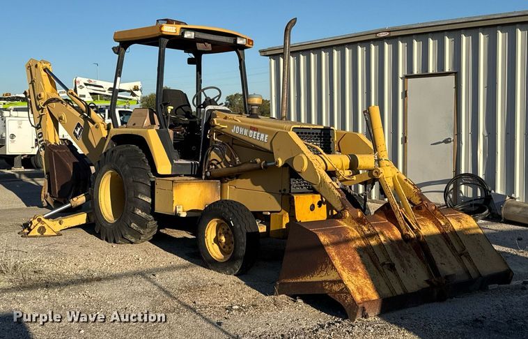 image for item EJ3192 1993 John Deere 310D backhoe