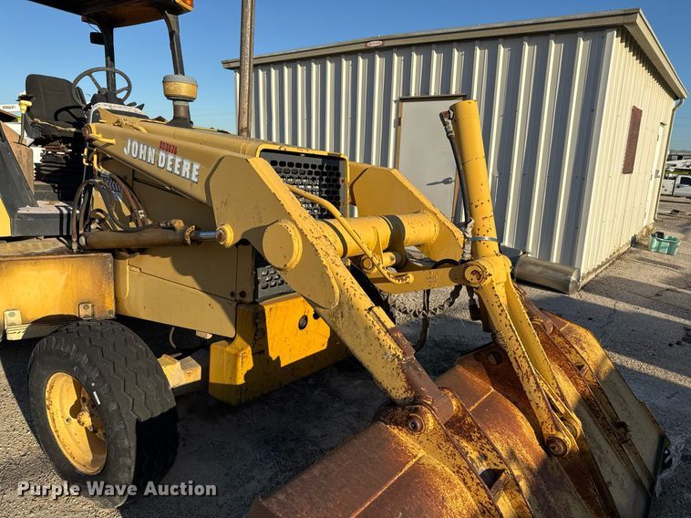 image for item EJ3192 1993 John Deere 310D backhoe