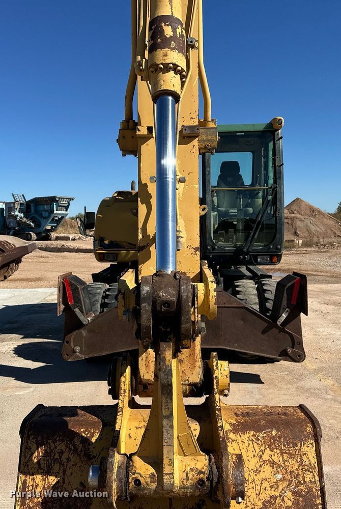 image for item EJ5059 2005 Caterpillar  M313C wheeled excavator