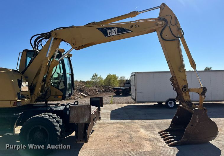 image for item EJ5059 2005 Caterpillar  M313C wheeled excavator