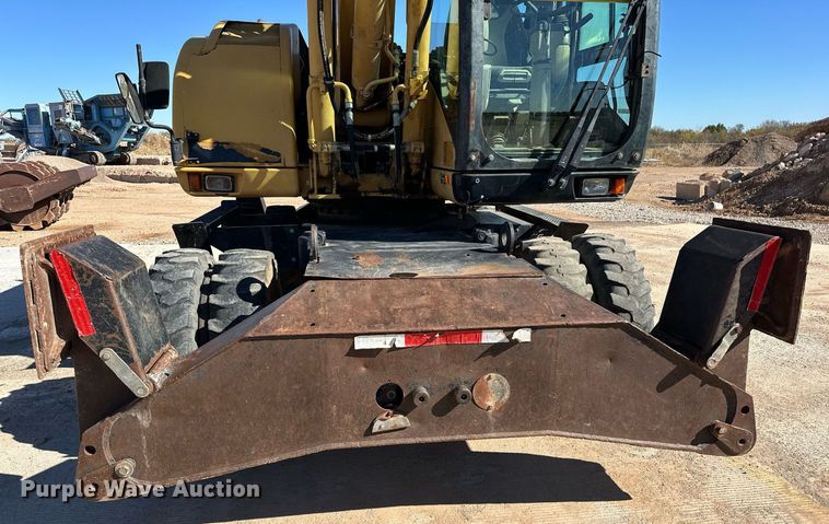 image for item EJ5059 2005 Caterpillar  M313C wheeled excavator