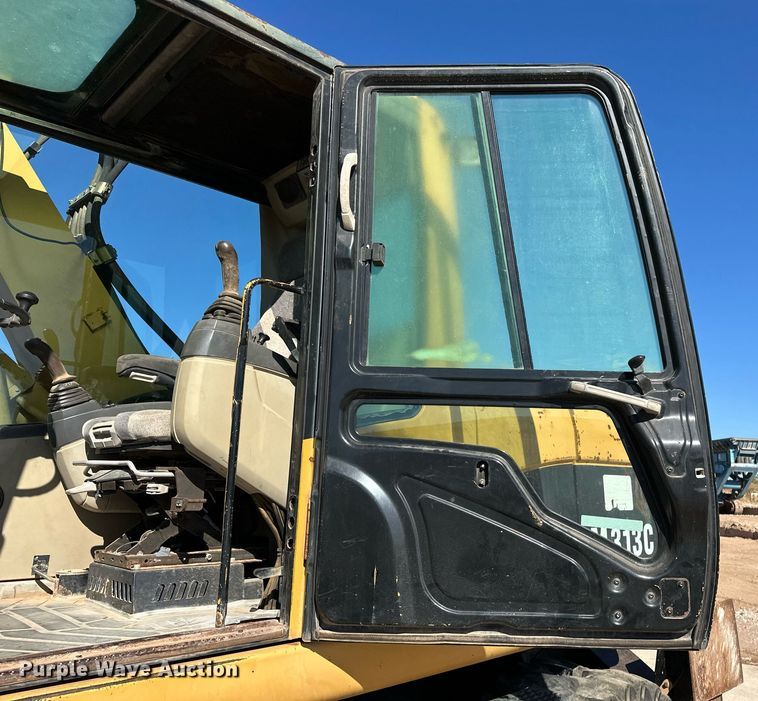 image for item EJ5059 2005 Caterpillar  M313C wheeled excavator