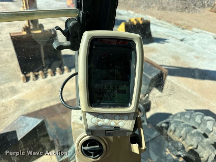 image for item EJ5059 2005 Caterpillar  M313C wheeled excavator