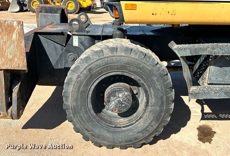 image for item EJ5059 2005 Caterpillar  M313C wheeled excavator