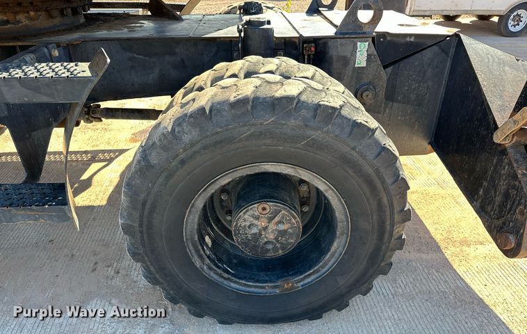 image for item EJ5059 2005 Caterpillar  M313C wheeled excavator