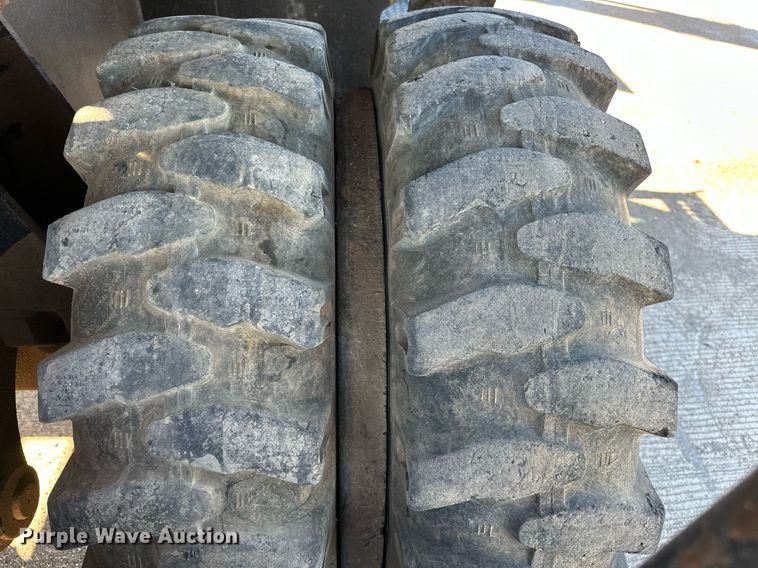 image for item EJ5059 2005 Caterpillar  M313C wheeled excavator