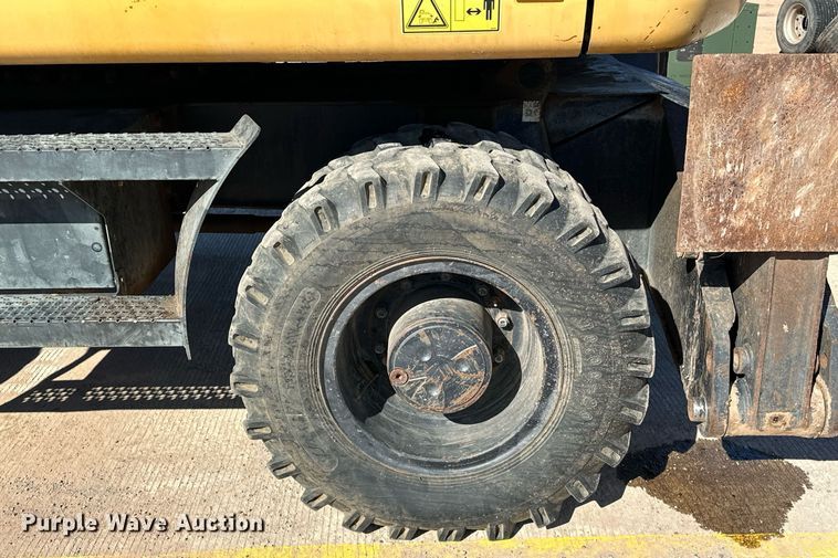 image for item EJ5059 2005 Caterpillar  M313C wheeled excavator