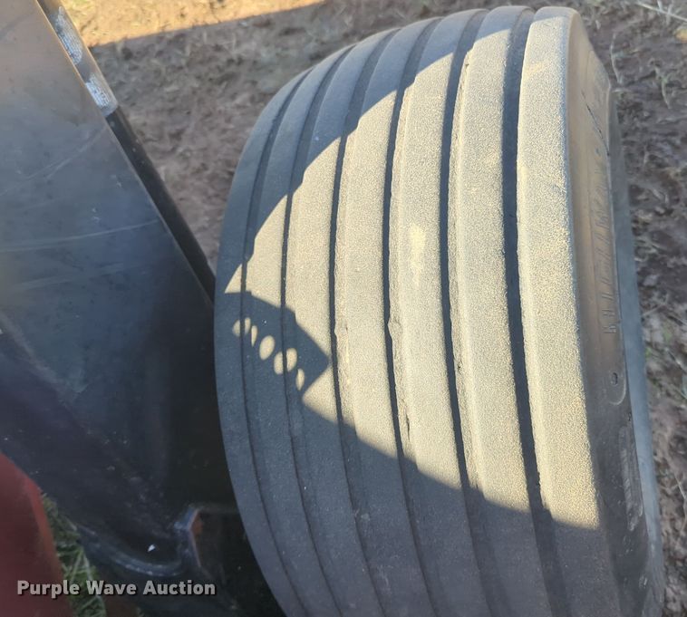 image for item EQ2487 2011 MacDon R85 swather / windrower