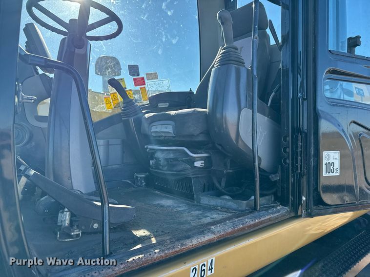 image for item DX3846 2011 Caterpillar M322D wheeled excavator