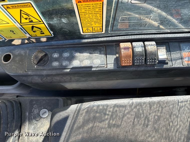 image for item DX3846 2011 Caterpillar M322D wheeled excavator