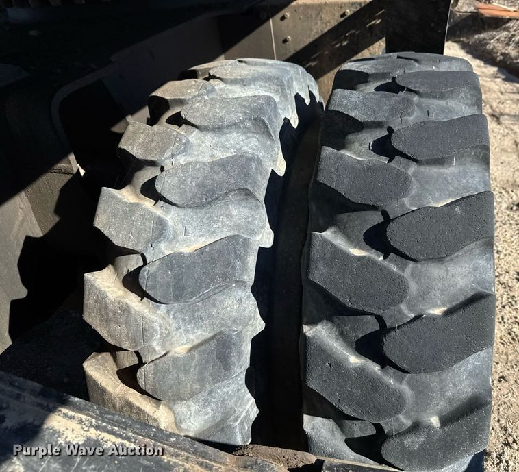 image for item DX3846 2011 Caterpillar M322D wheeled excavator