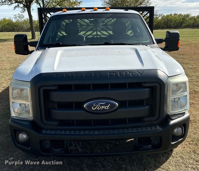 image for item DP6005 2016 Ford F350 Super Duty flatbed pickup truck