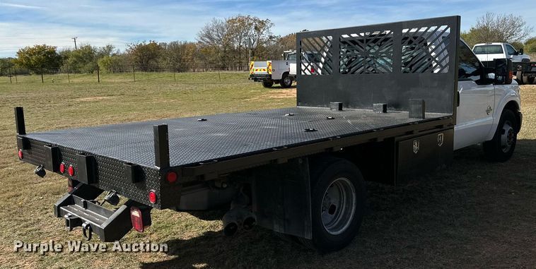 image for item DP6005 2016 Ford F350 Super Duty flatbed pickup truck