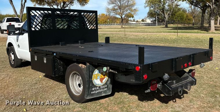 image for item DP6005 2016 Ford F350 Super Duty flatbed pickup truck