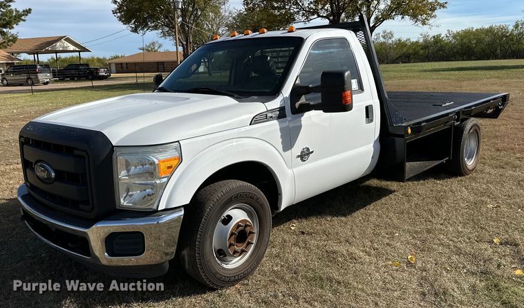 image for item DP6007 2015 Ford F350 Super Duty flatbed pickup truck