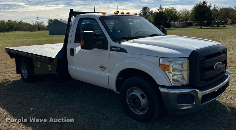 image for item DP6007 2015 Ford F350 Super Duty flatbed pickup truck
