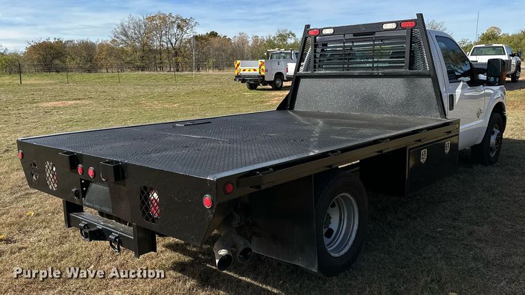 image for item DP6007 2015 Ford F350 Super Duty flatbed pickup truck