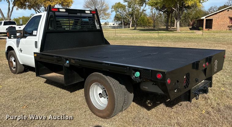 image for item DP6007 2015 Ford F350 Super Duty flatbed pickup truck