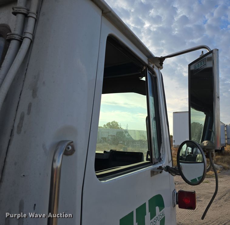 image for item DW3846 2006 AutoCar XPeditor roll-off container truck