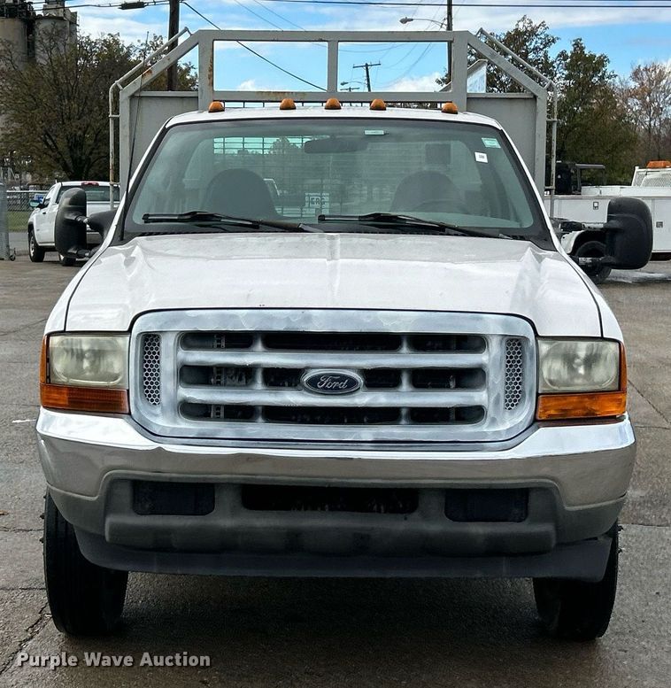 image for item NJ9564 1999 Ford F450 Super Duty XL flatbed truck