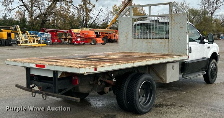 image for item NJ9564 1999 Ford F450 Super Duty XL flatbed truck