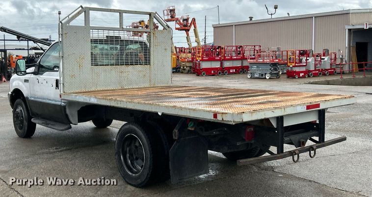 image for item NJ9564 1999 Ford F450 Super Duty XL flatbed truck