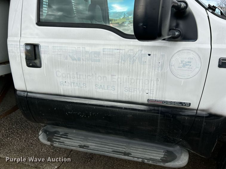 image for item NJ9564 1999 Ford F450 Super Duty XL flatbed truck