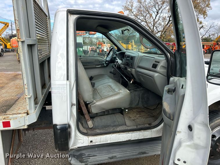 image for item NJ9564 1999 Ford F450 Super Duty XL flatbed truck