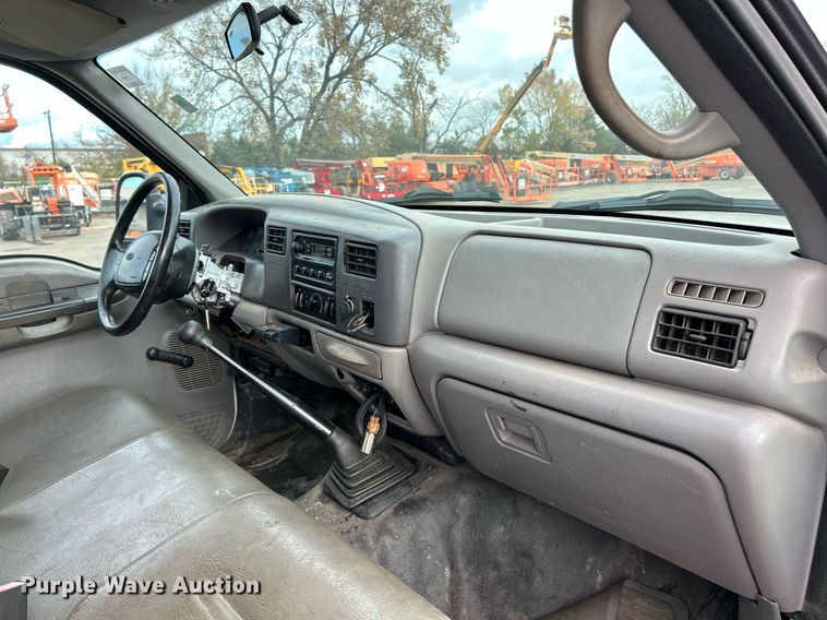 image for item NJ9564 1999 Ford F450 Super Duty XL flatbed truck