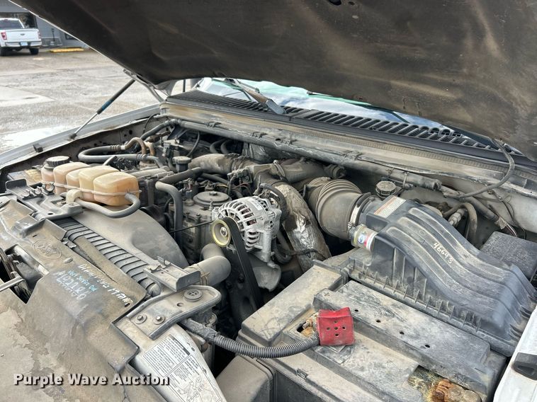 image for item NJ9564 1999 Ford F450 Super Duty XL flatbed truck