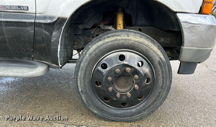 image for item NJ9564 1999 Ford F450 Super Duty XL flatbed truck