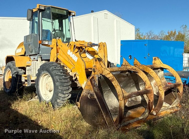 image for item DO7635 2000 John Deere 344H wheel loader