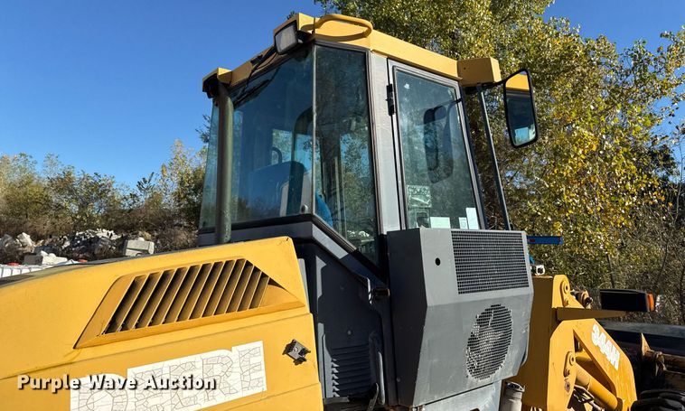 image for item DO7635 2000 John Deere 344H wheel loader