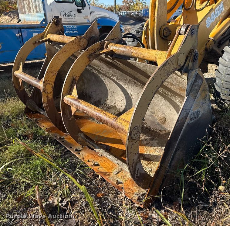 image for item DO7635 2000 John Deere 344H wheel loader