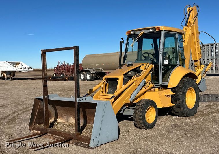 image for item DQ3160 1997 New Holland 575E backhoe