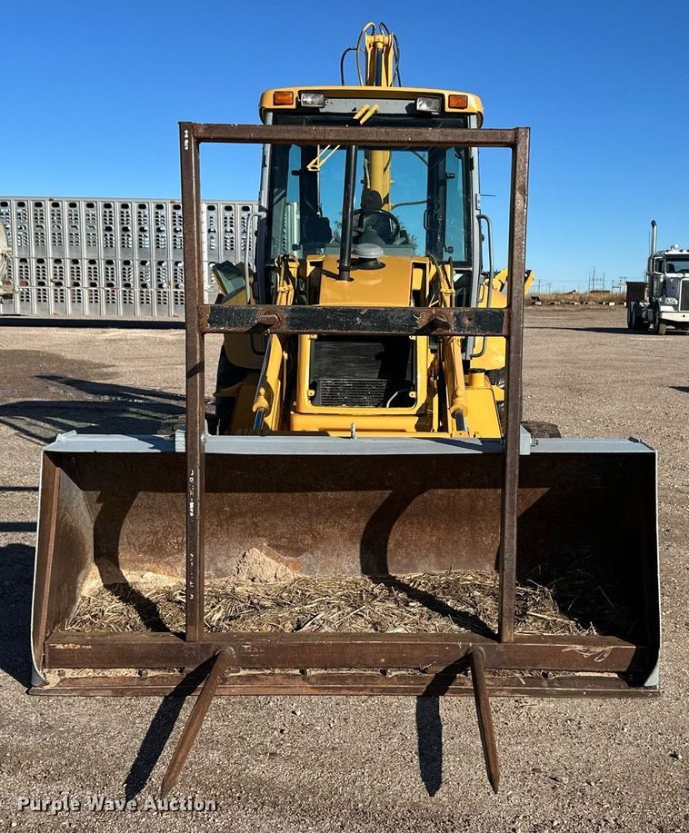 image for item DQ3160 1997 New Holland 575E backhoe